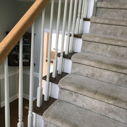 Existing downstairs wood after sand and finish, stair hall