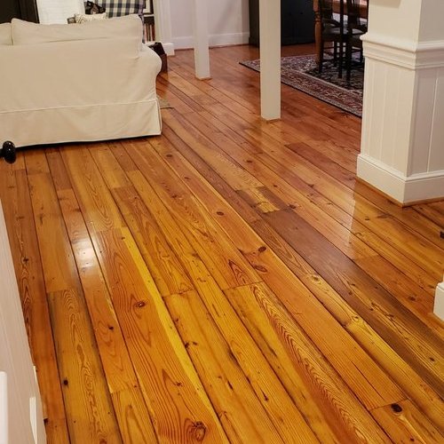 Finished hardwood pine floors by Preferred Floors team