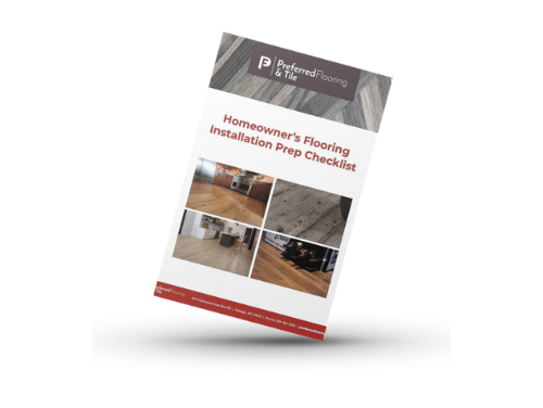 Homeowners meeting with design experts to choose luxury flooring and tile in Raleigh showroom